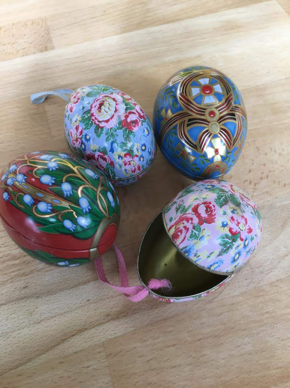 The problem with Easter Eggs - these tins in the shape of Easter Eggs can be filled with sweet treats and reused next year.